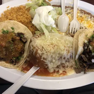 3- item combo plate 2 tacos al pastor,  chili relleno , which was fantastic. And of course rice and beans.