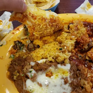They plated the taco on top of the enchilada.