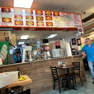 a man standing in front of the counter