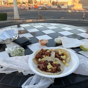 Outdoor seating with some Al Pastor
