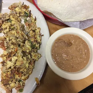 Delicious!  This a pic of half the Machada plate w/ a little extra refried beans &amp; tortillas I&apos;m taking to go,  gonna share! Will be back!
