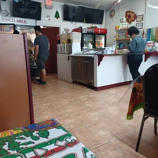 two people in the kitchen
