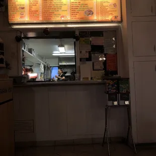 a view of a restaurant counter