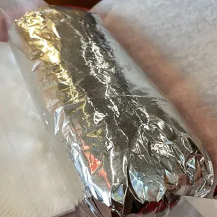 a burrito wrapped in foil