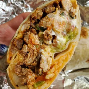 Al pastor super burrito/no beans.