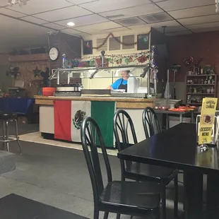 a table and chairs in a restaurant