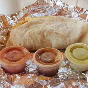 Bean egg cheese taco and all 3 salsas (from L to R, habanero, red, green)