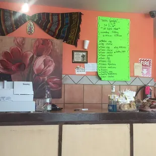 Notice the green sign of breakfast taco specials Mon-Fri mornings 6am-11am.