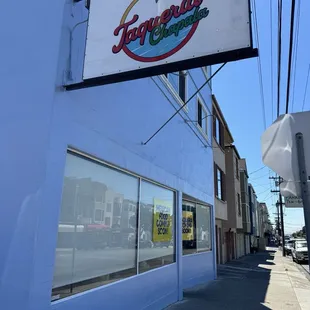 Outside - latest sign says August 10 grand opening!