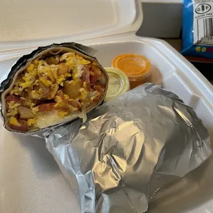 Breakfast Burrito with bacon, potato, eggs, and cheese