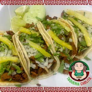 three tacos on a plate