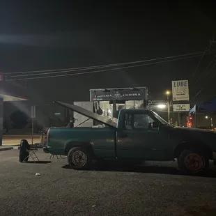 a pickup truck parked in a parking lot