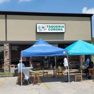 Tent seating finally during Corona pandemic while eating at T. Corona  and drinking Corona...