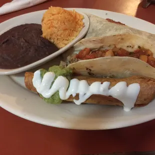 Numero Uno. Wasn&apos;t a fan. Watery juice from the chicken makes everything soggy. Processed guacamole. No cheese anywhere. Beans OK.