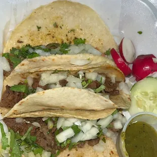 Carne asada tacos with green salsa