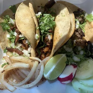 Al Pastor &amp; Beef tacos. They are amazing and fresh! The pork tacos are becoming my favorite.