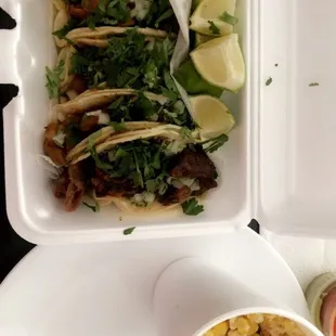 Chicarron, pastor, tripa tacos, elote