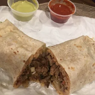 Carne Assad burrito, comes with rice, beans, onions &amp; cilantro. Green sauce is very tasty &amp; spicy. Red sauce isn't very good in my opinion.