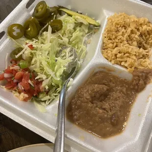 Rice and beans with salad