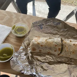  a burrito wrapped in tin foil