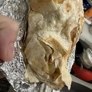 One of the burritos old hard tortilla