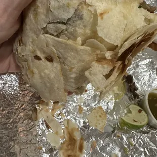 Stale hard crumbling tortilla