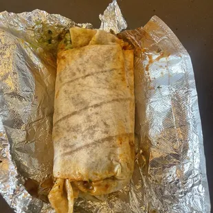 Sauce barely kept it inside and leak everywhere.