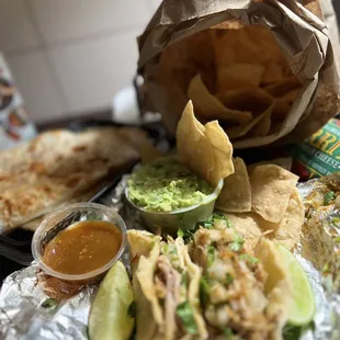 tortilla, guacamole, tortilla, salsa, tortilla, and