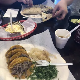 ows a man eating a taco with a fork