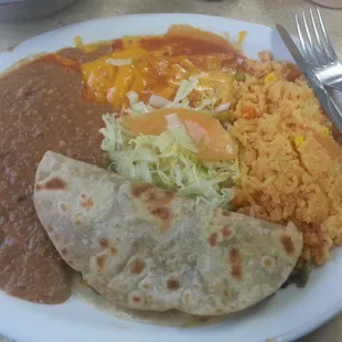 Enchilada and fajita taco plate. Very good and authentic.