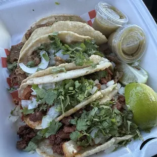 Tripa and pastor tacos