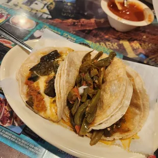 Nopales tacos and poblano queso tacos. Great vegetarian options.