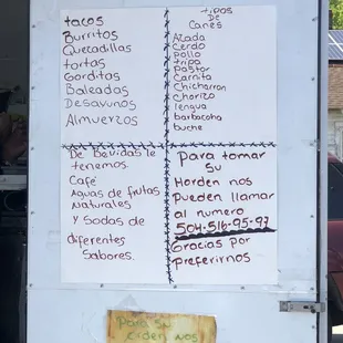 a menu on a food truck