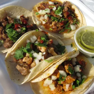 Clockwise from bottom: Al pastor, carnitas, bistek, and the fantastic lengua.