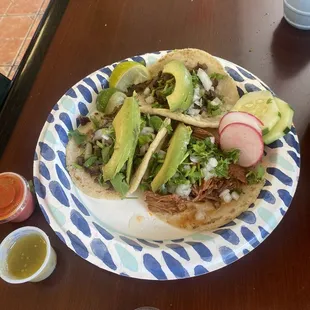 Carne asada tacos and barbacoa.
