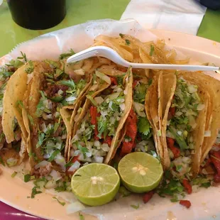 a plate of tacos on a table