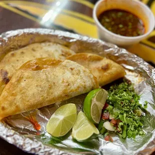 Quesabirria tacos with consommé