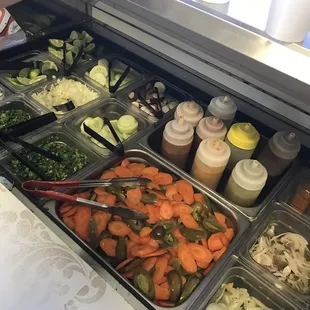 Amazing toppings bar for your food!!! All is extremely fresh!! Try the carrots