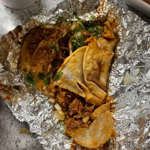 a taqueria with meat and vegetables