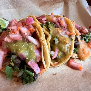 Steak tacos after a trip to the "salsa bar".