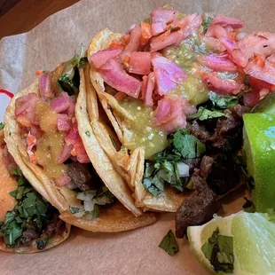 Steak tacos after a trip to the "salsa bar".