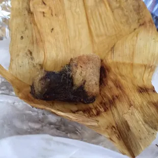 I've never seen nor tasted anything like this "chicken" tamale.  I wish I had two more arms so I could give it 4 thumbs down.