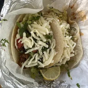 Supposed to be Al Pastor, but I think they accidentally gave us Carnitas... ordered w/ everything on top