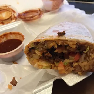 Carne asada burrito with salsa roja. Closest thing to a burrito from San Diego while you're in Indy