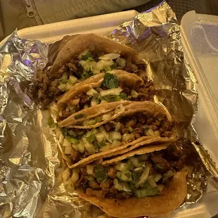 1 asada street taco and 3 al pastor street tacos