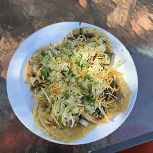 2 Asada and 2 Carnita tacos! Delicious