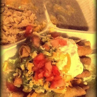 Five taquito w/guacamole and sour cream combo.