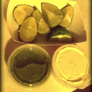The container containing lime wedges is the same size as the one my taco was in, for size reference.