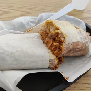 Breakfast burrito with chorizo cut open
