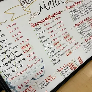 a menu on a white board